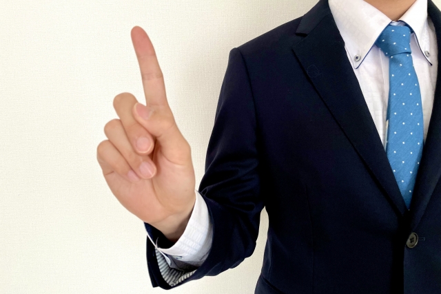 指差しするサラリーマン